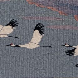 Trois grues du Japon  sur un ciel bleu 